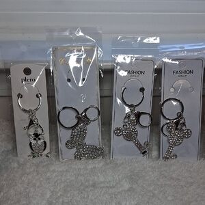 NIP Four Pieces Bag Charm/ Key Holder Bundle